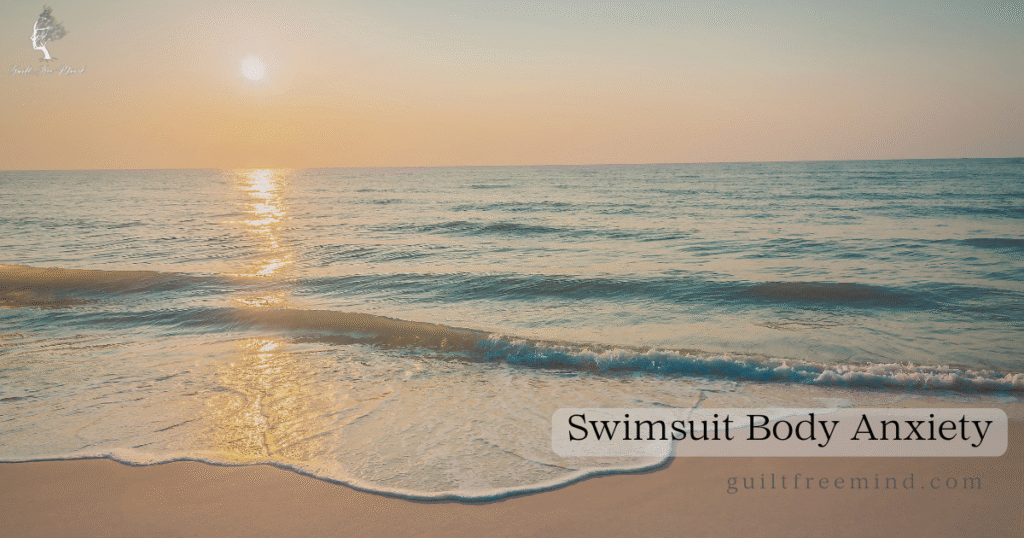 Serene sunrise over a calm ocean with gentle waves on the sand, overlay text reads “Swimsuit Body Anxiety” – capturing the peaceful yet emotionally charged feeling many experience with swimsuit season body anxiety.